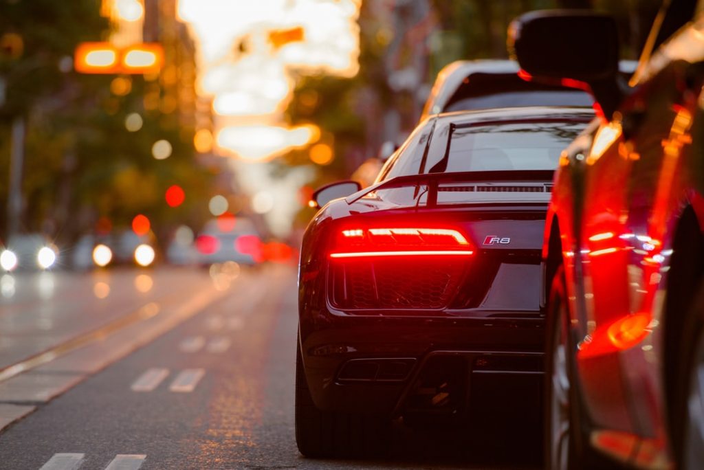 Car on a street waiting for street light