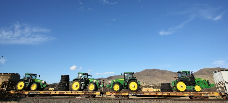 John Deere tractors on a train car in Pocatello, Idaho.